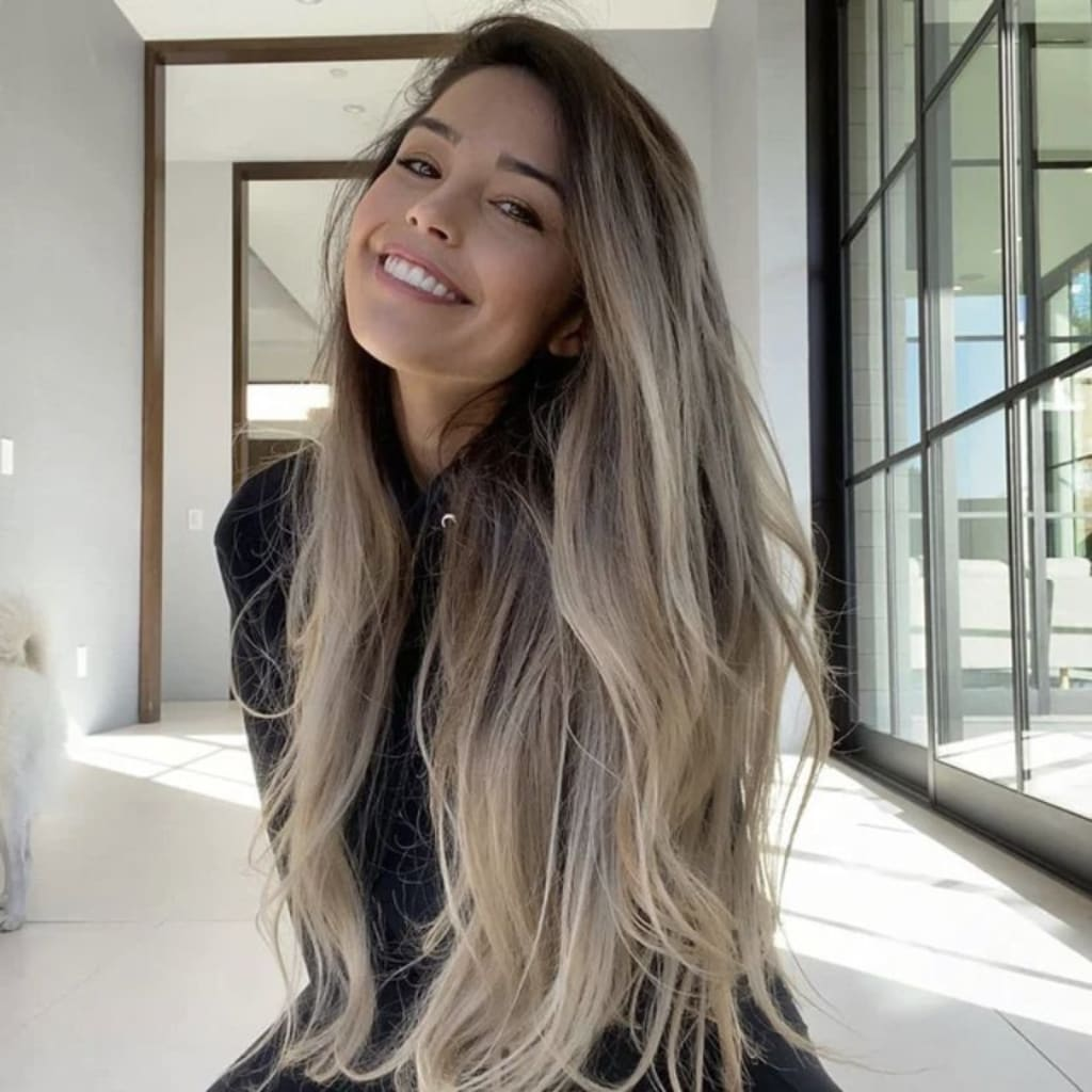 This image visually supports the article by showing Valkyrae in a casual setting, helping readers connect the profile with her public image as a popular YouTube creator and gaming personality.