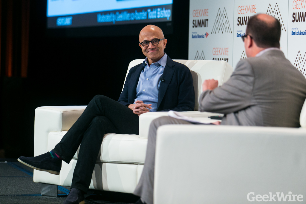This image illustrates a professional technology leadership discussion, highlighting executive insights, innovation, and the future of the tech industry.